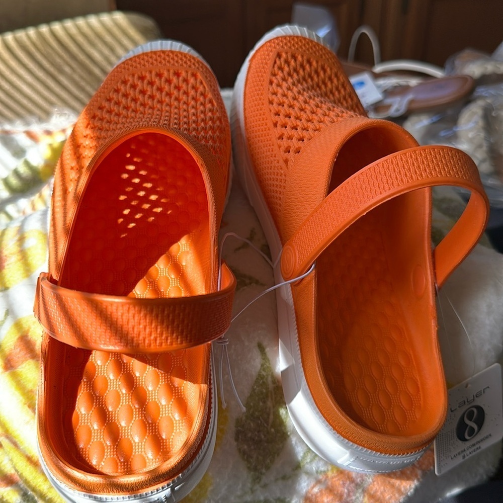Layers pair of croc like sandals, Really pretty orange and white size 8.​​